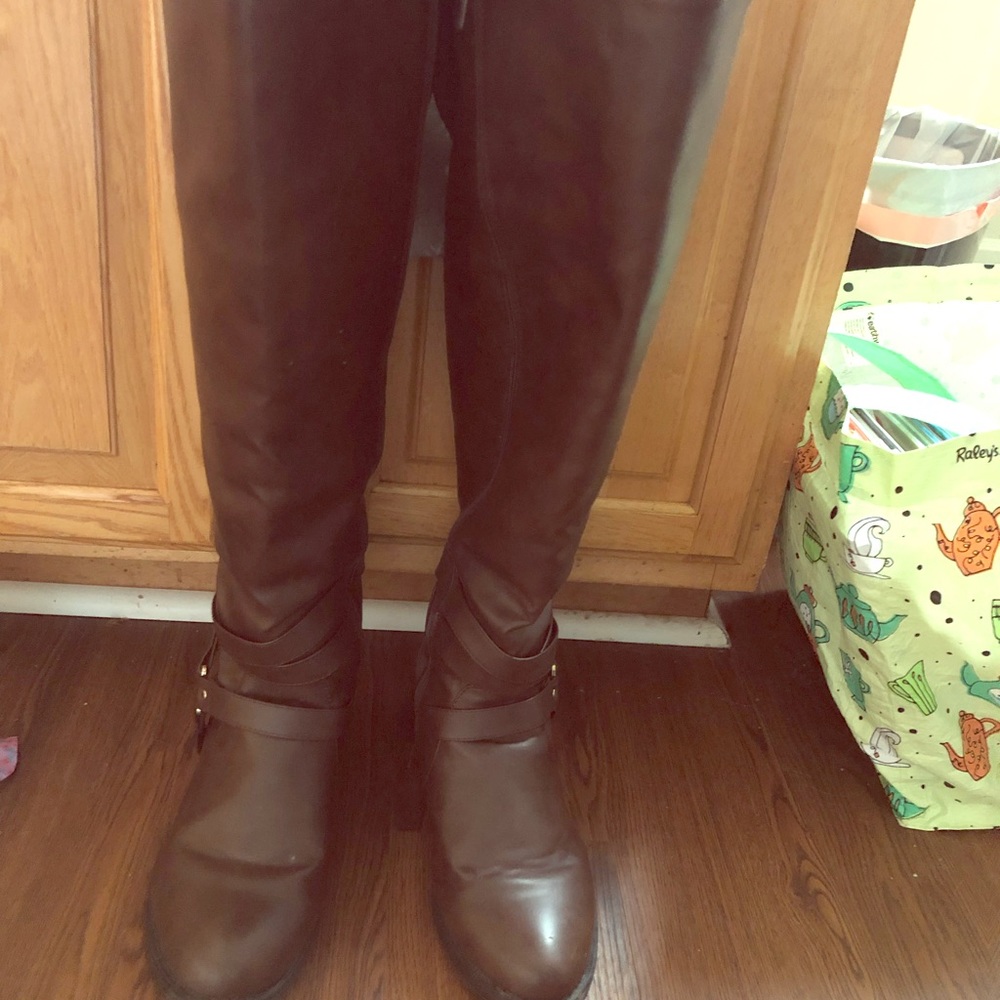 Over the knee brown boots.